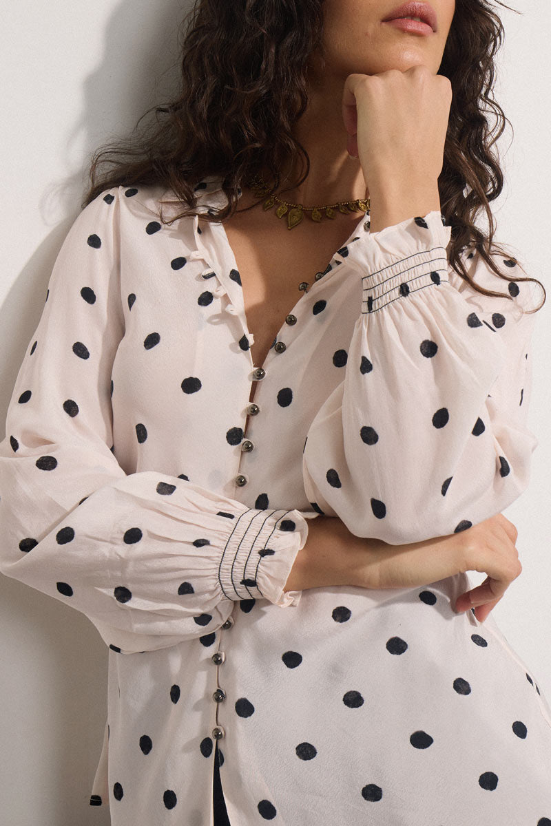 Model wears East Heritage Miriyam spot print blouse.