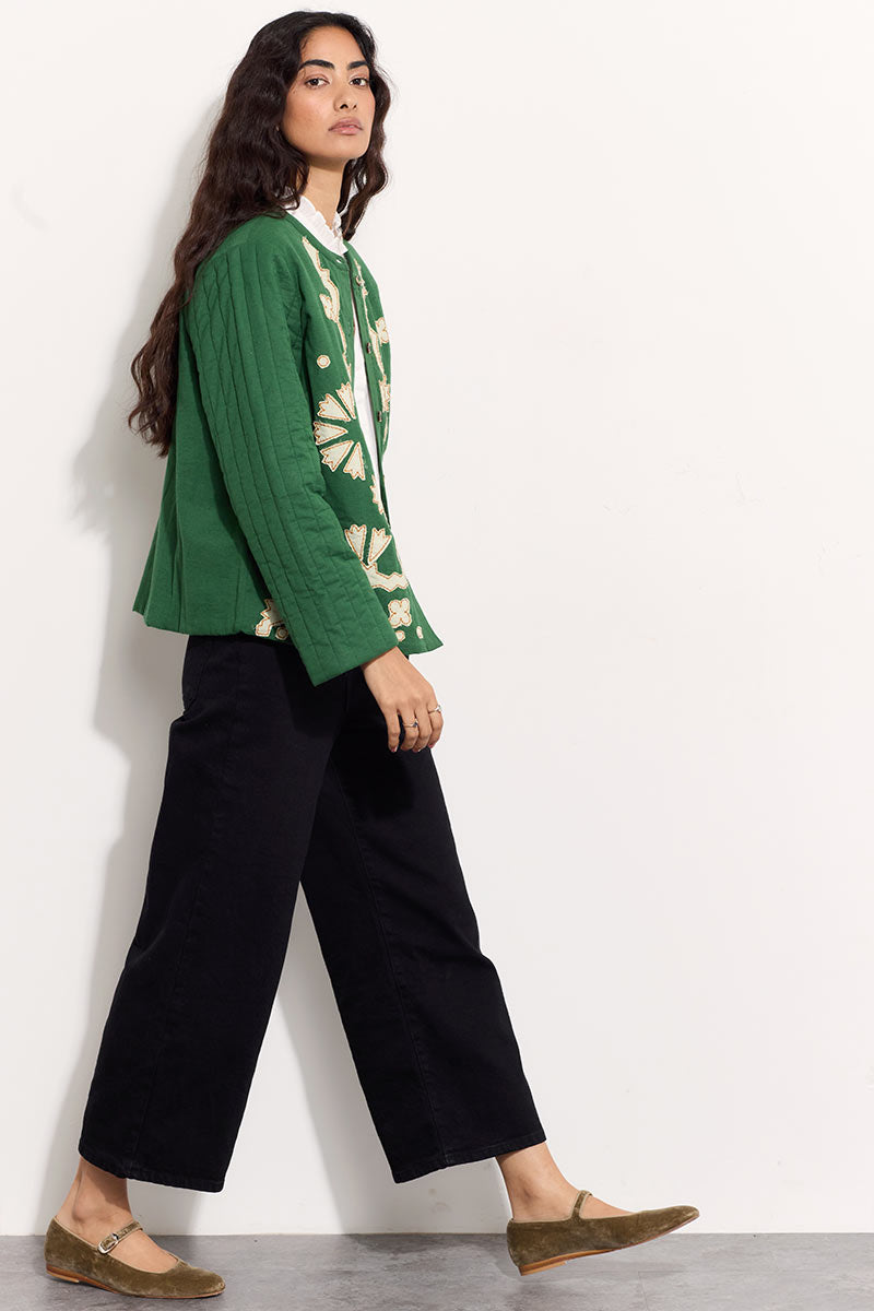 Model wears EAST Jill green applique quilted jacket.