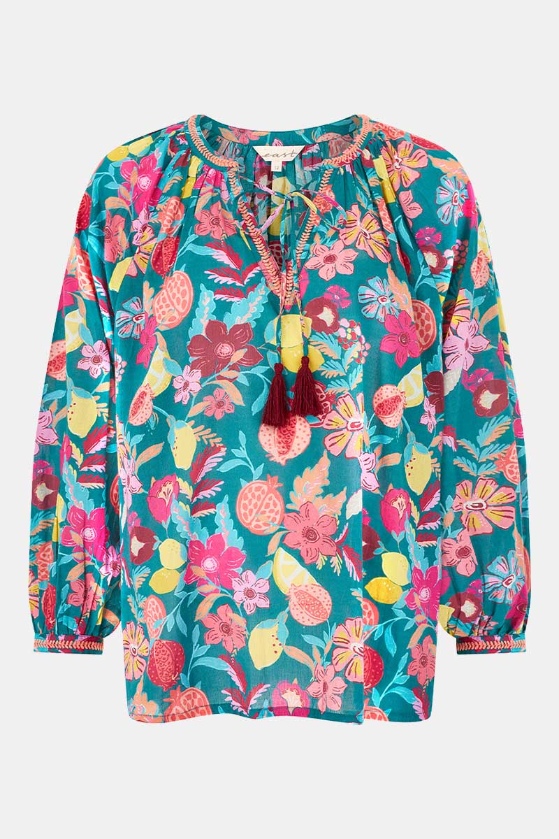 Front shot. East x Romy Gill, Romy Green Top.