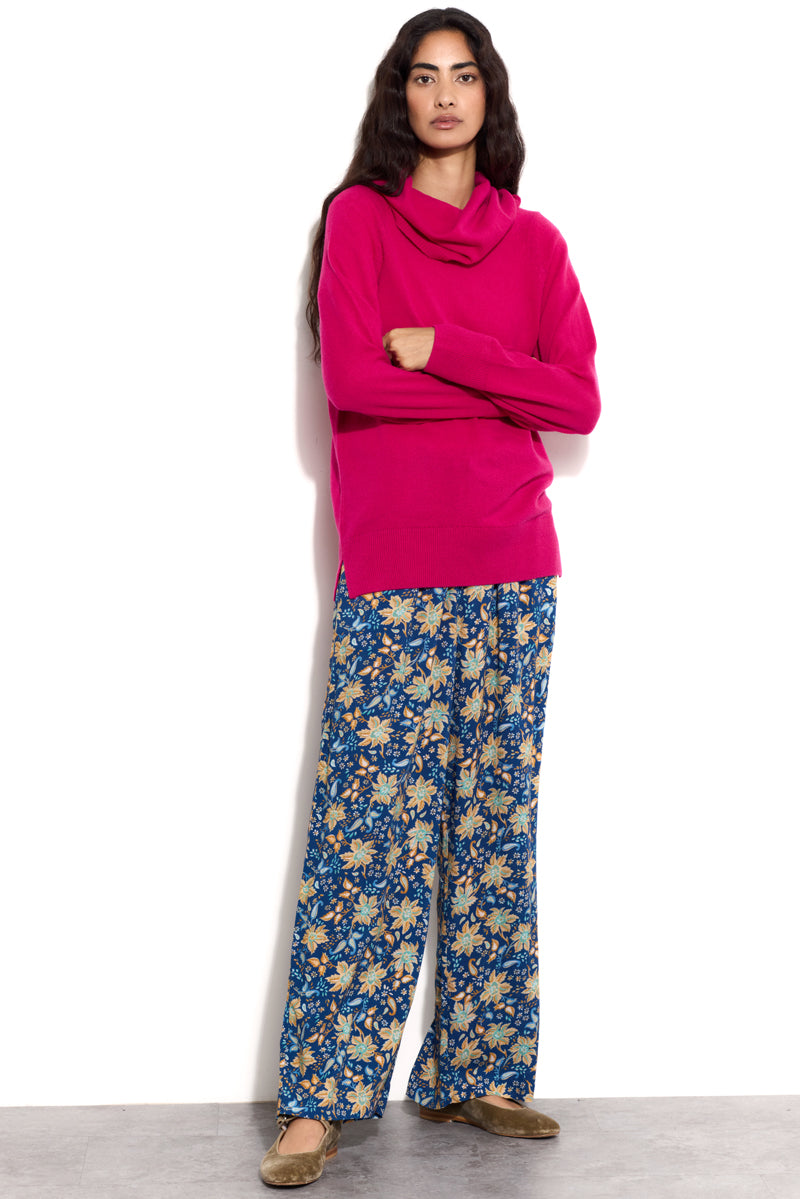 Model wears EAST Ruhn Pink Cashmere Roll Neck Jumper