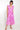 Model wears East Heritage Marnie Pink Cotton Dobby Dress