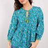 Model wears East Ecovero Blouse front view close up