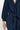 Close up of model wearing East Hera Navy Organic Cotton Gauze Jumpsuit