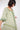 Model wearing Harriet Green Organic Cotton Belted Dress by East.co.uk