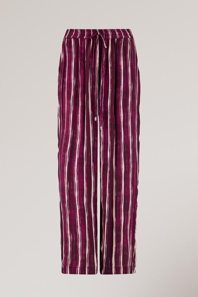 Flat shot, front view of Amiri Trousers