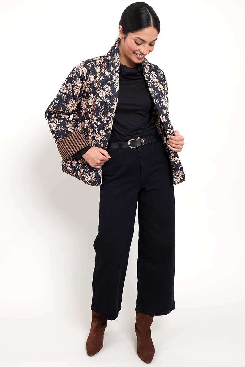 Model wears East Heritage Erin printed quilted jacket.