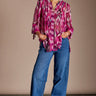 Model wears Kayleigh Raspberry Georgette Blouse by east.co.uk