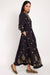 Model wears Gabriella black dress with gold embroidery by east.co.uk