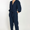 Model wears East Hera Navy Organic Cotton Gauze Jumpsuit