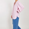 Side view of Model wearing East Hera Pink Blouse