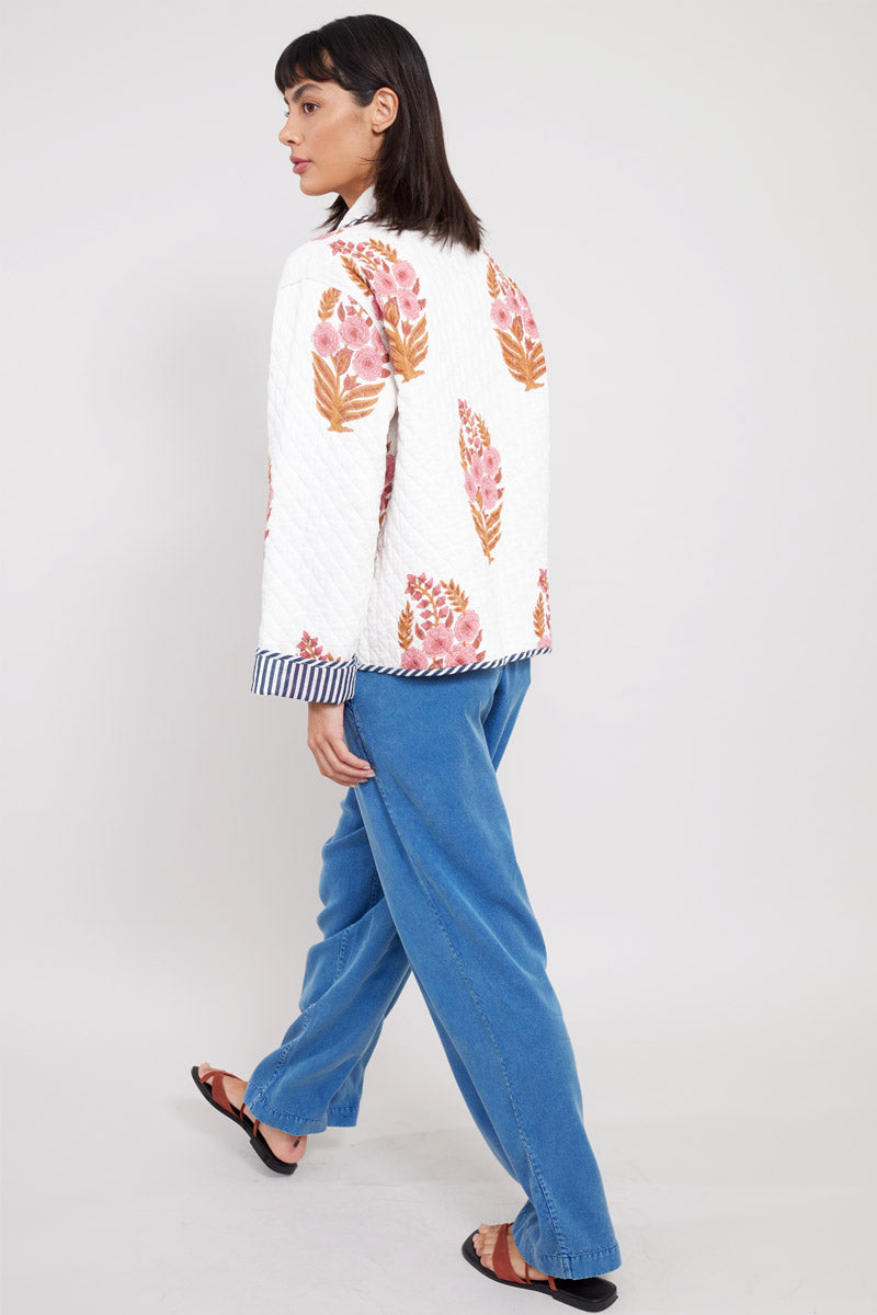 Back view of model wearing East Kenzie Jacket with East Tessa Trousers