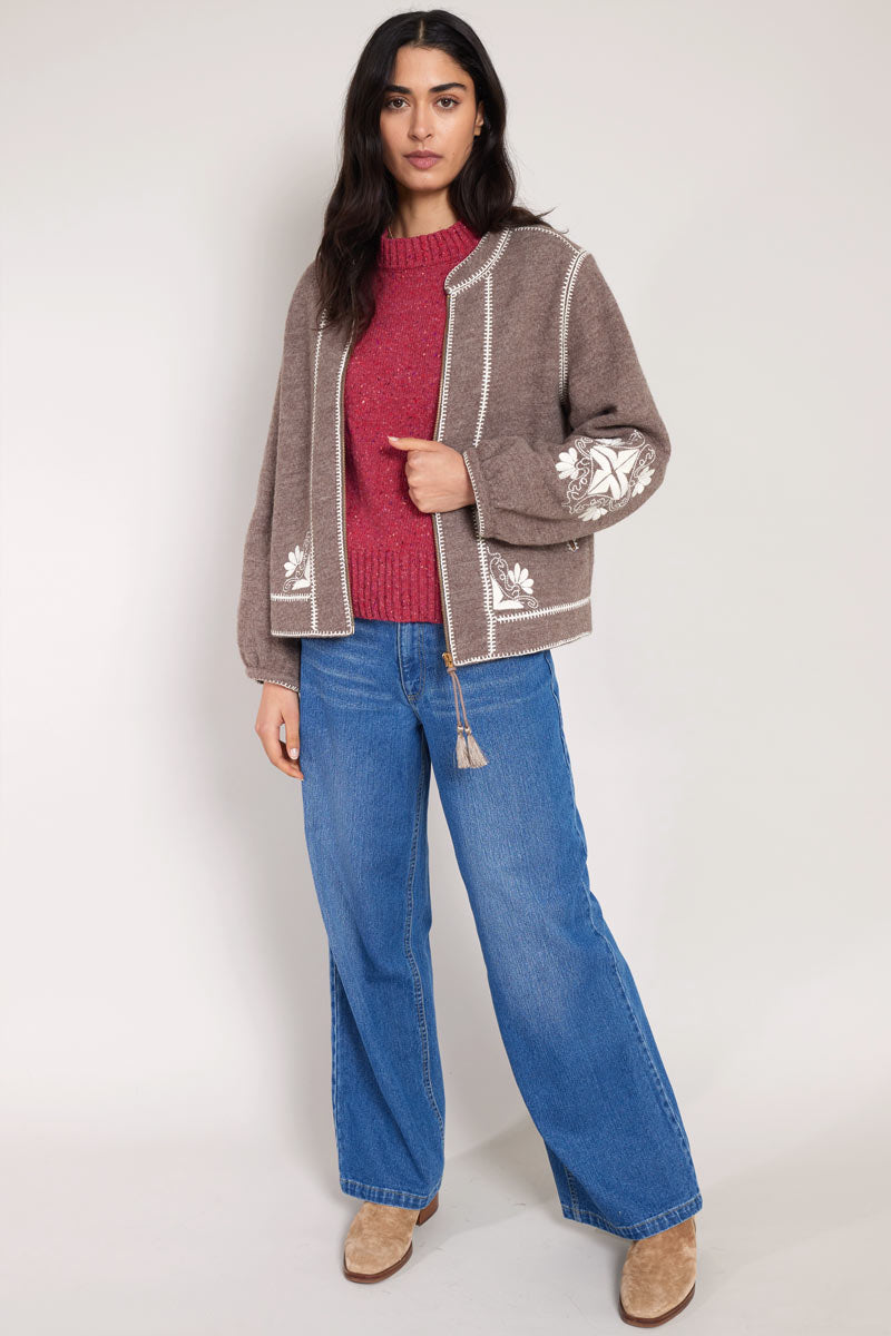 front view of model wearing East wool bomber
