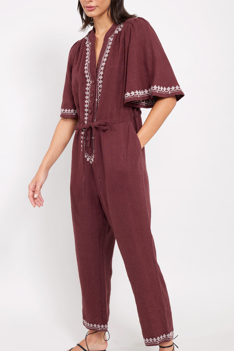 Side view of model wearing Vivi Embroidered Jumpsuit