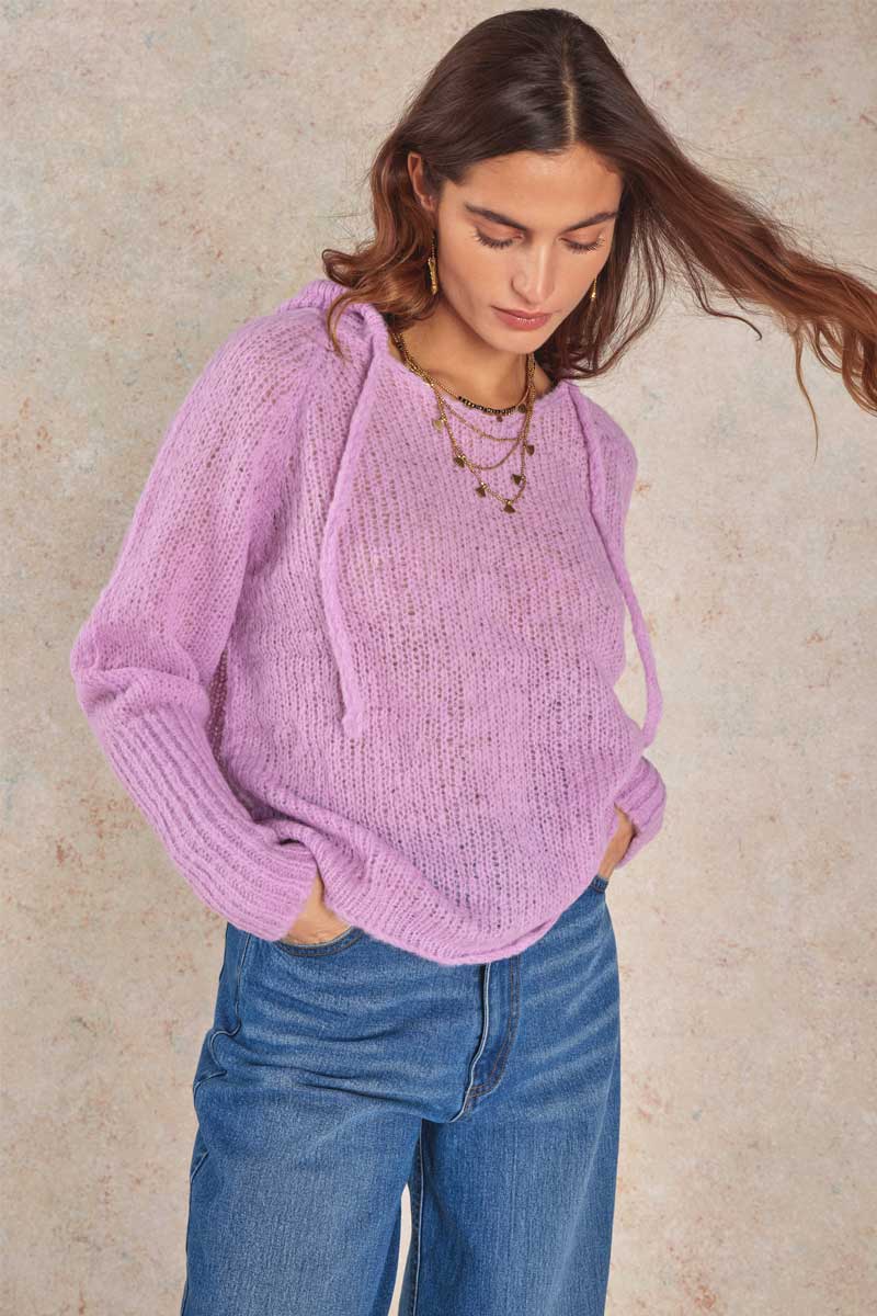 Model wears Naina Handknitted Dusty Pink Alpaca Jumper, close up front view