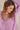 Model wears Naina Handknitted Dusty Pink Alpaca Jumper, close up
