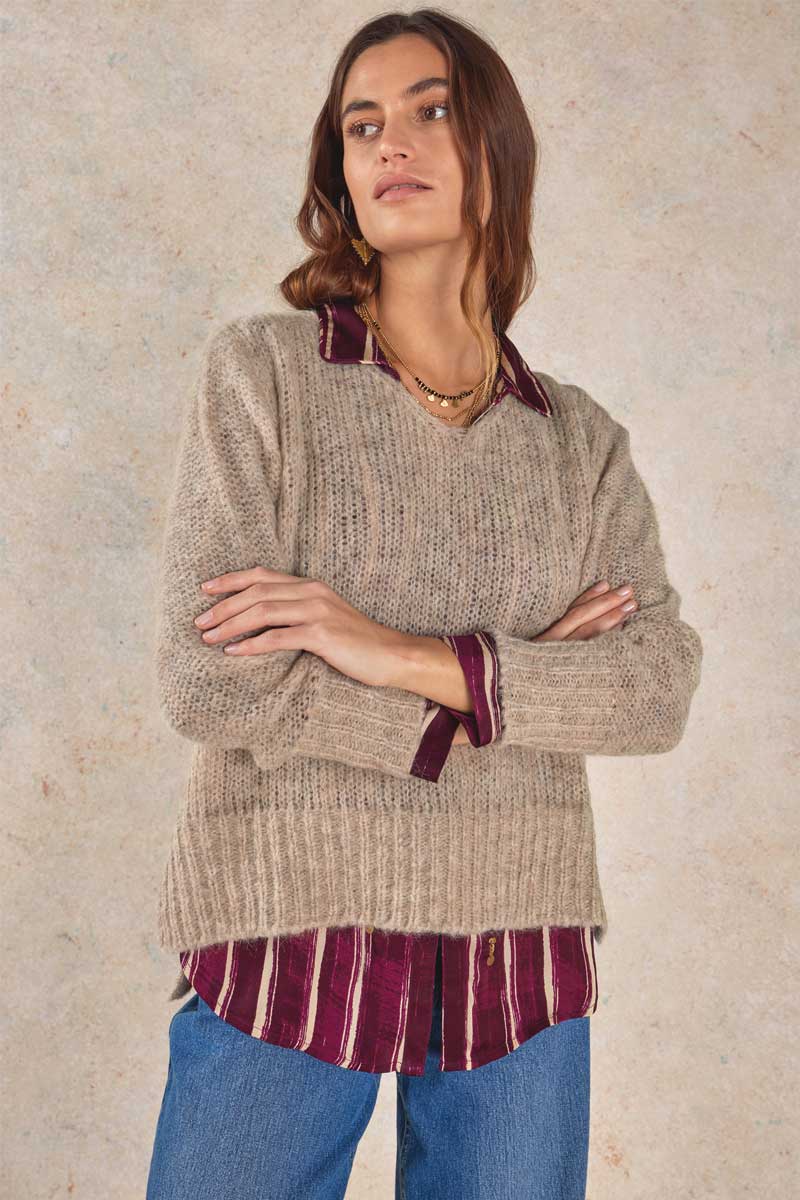 Model wears Michele & Hoven Joyce Natural Alpaca jumper, front view hand arms crossed