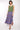 Model wearing Alex Print Crinkle Tiered Skirt by East.co.uk