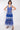 Model wearing Dallyn Blue BCI Cotton Sleeveless Dress by East.co.uk