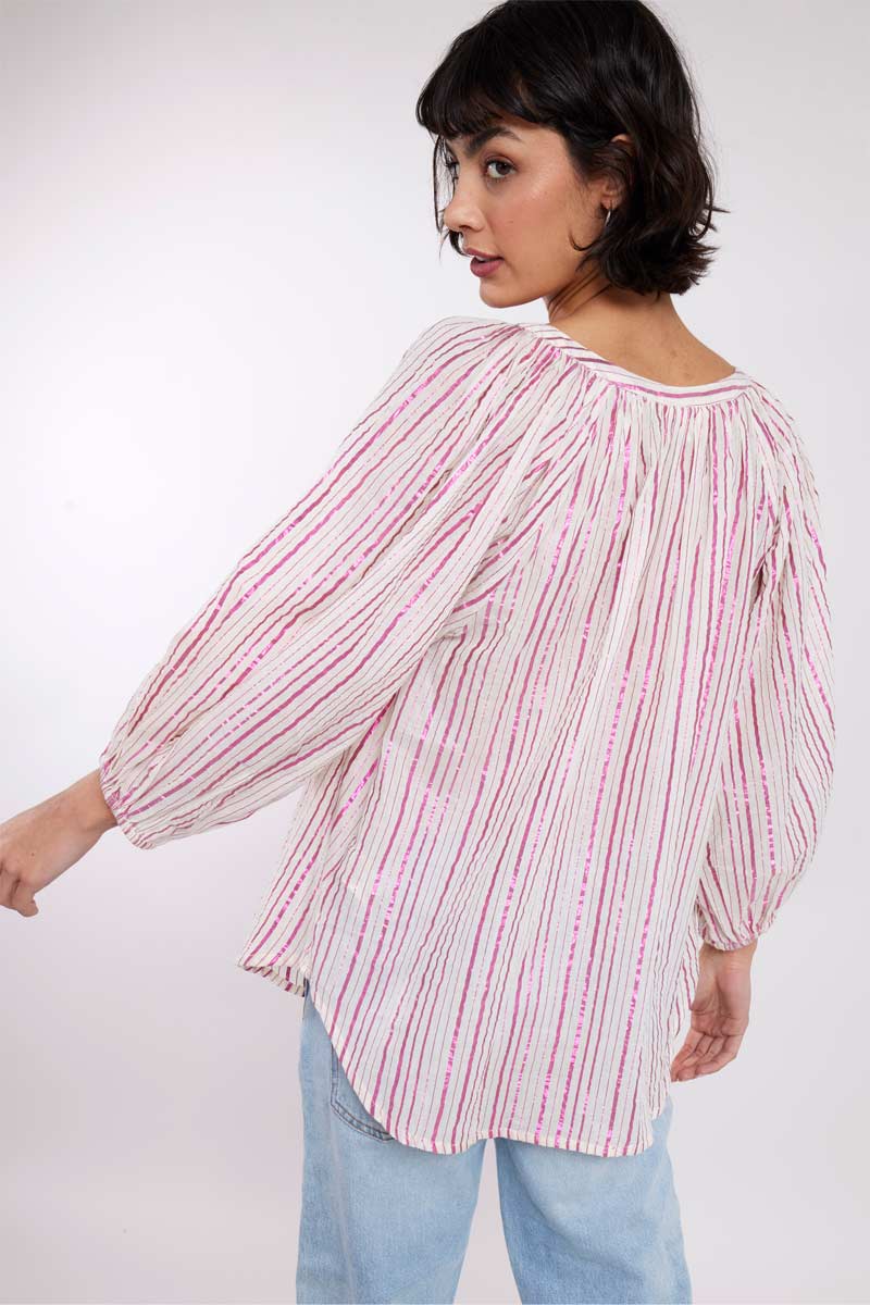 Model wearing Serene Pink Lurex Cotton Blouse by East.co.uk